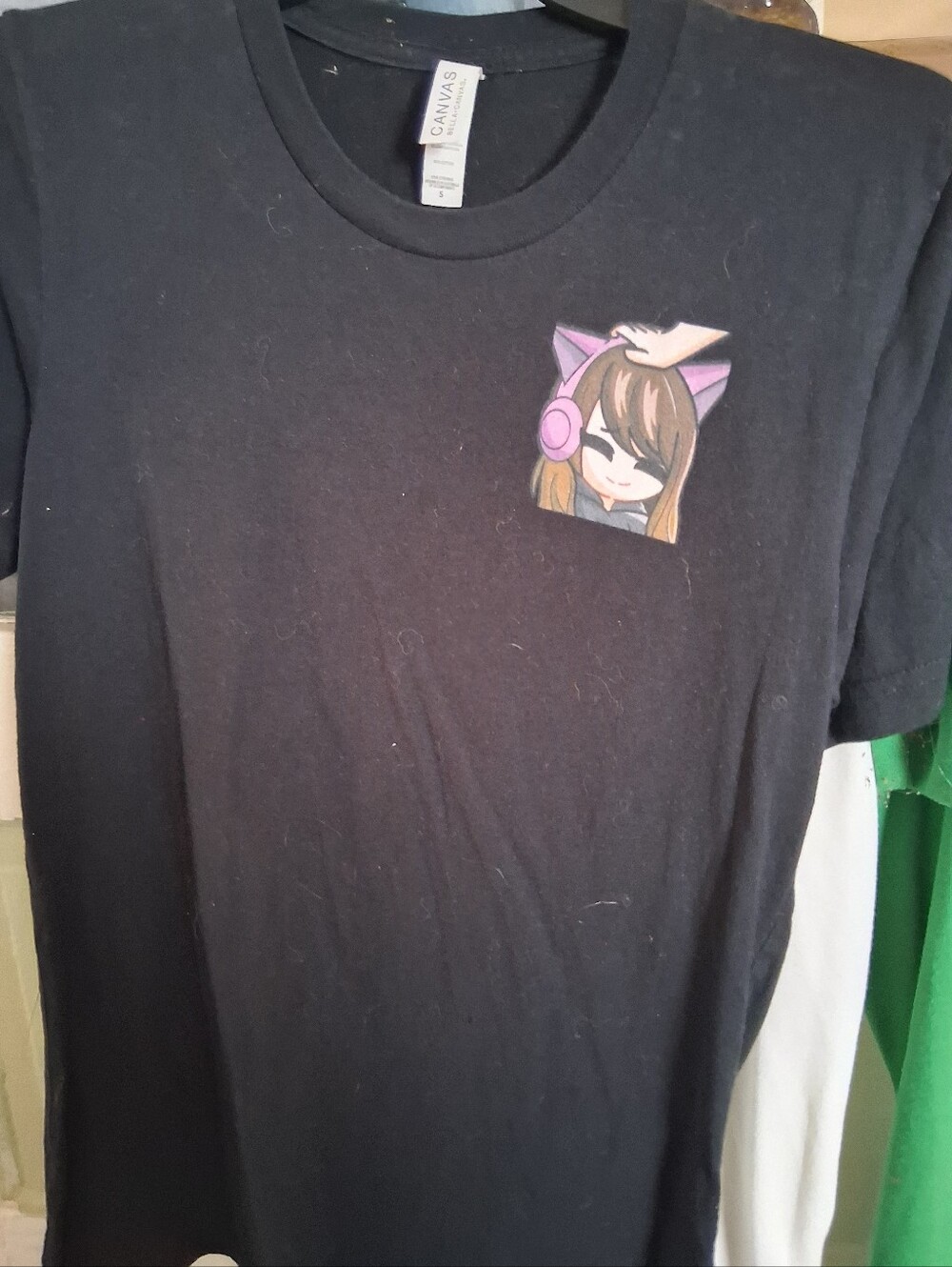 Bella Canvas Black Tee with Pink Cat-Ear Headphones Pocket Graphic